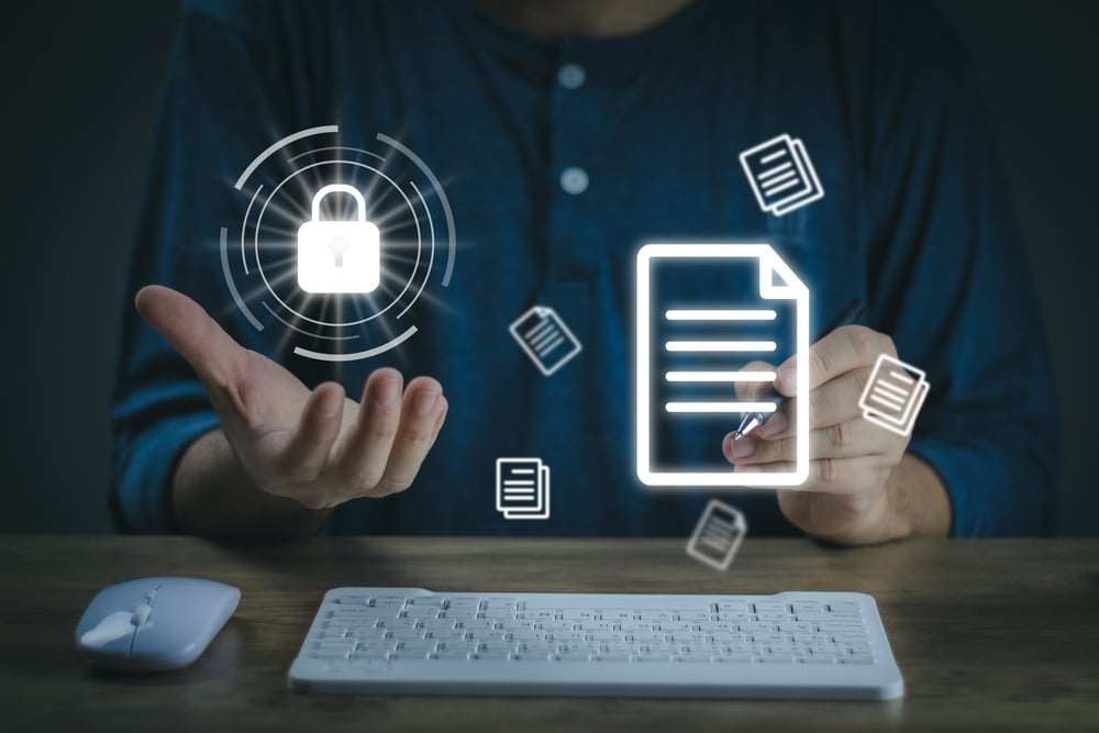Cybersecurityconceptmanworkingoncomputerthatisdesigned | enstep technology solutions Managed Cybersecurity Vs Traditional