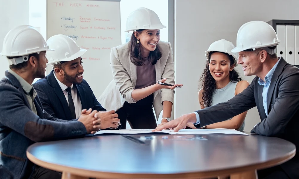 construction team gathered talking about IT solutions