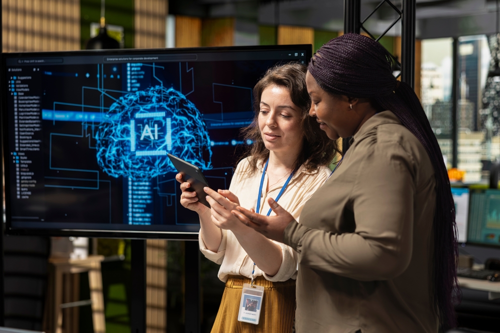 DiverseManagementStaffReviewingAdvancedAiAlgorithmsAndPredictiveModels ai strategy